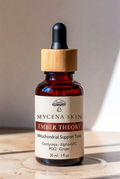 Ember Theory mitochondrial support tonic — Mycena Skin red-clay glass dropper bottle with bamboo cap